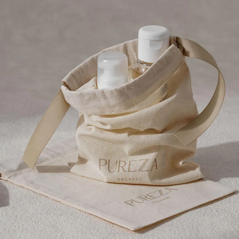 Pochette à cordon en coton nat - Luxury Skincare Gifts avis et prix